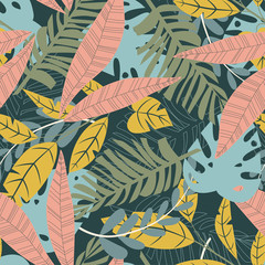 Bright abstract seamless pattern with colorful tropical leaves and plants on green background. Vector design. Jungle print. Floral background. Printing and textiles. Exotic tropics. Fresh design.