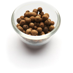 pepper sweet peas dried isolated in a glass plate