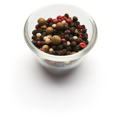 mix of peppers dried isolated in a glass plate