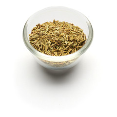 rosemary dried isolated in a glass plate
