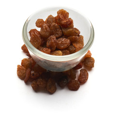 Classic raisins isolated in a glass plate