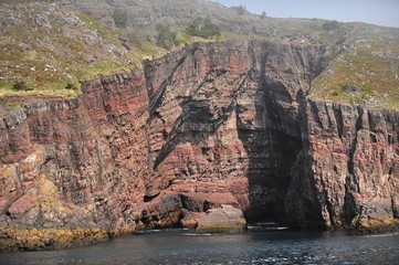 Beautiful stony shores of the Atlantic Ocean (Newfoundland Island, Canada).