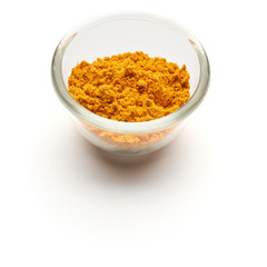 saffron ground isolated in  a glass plate