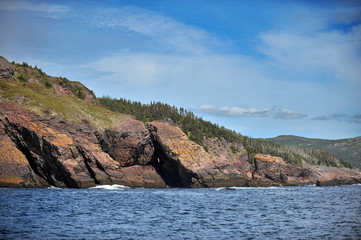 Beautiful stony shores of the Atlantic Ocean (Newfoundland Island, Canada).