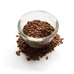 flax seeds isolated a glass plate