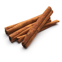cinnamon sticks in a glass plate isolated