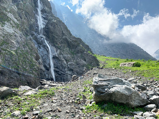 Russia, North Ossetia. Midagrabindon waterfall in cloudy weather