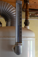 thermometer on a wood fired bathroom boiler made in Germany 