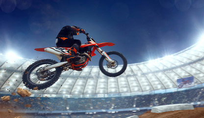 Motocross riders in action. Supercross. Motocross sport.