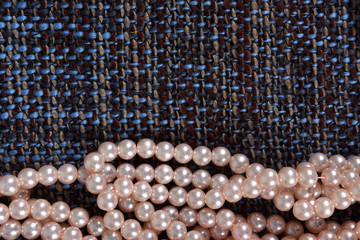Pearl necklace on the gray background texture