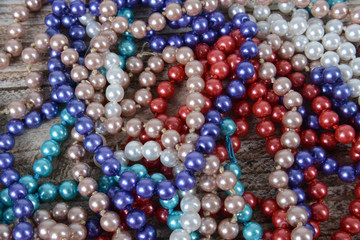 Background of colorful beads on the table.