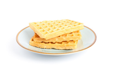 Belgian waffles on plate isolated on white background