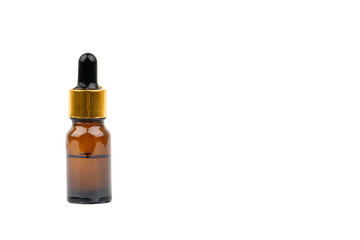 Dropper serum and brown glass bottle isolated on white background. Skin care, drug and cosmetic concept