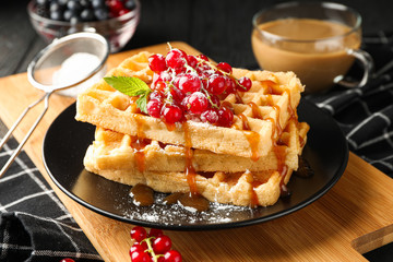 Beautiful composition with sweet belgian waffles, closeup