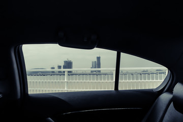 Looking through a car window with view of Central Park and a beautiful cityscape of Macau china