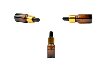 Dropper serum and brown glass bottle isolated on white background. Skin care, drug and cosmetic concept