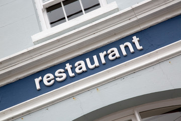 Restaurant Sign on Building