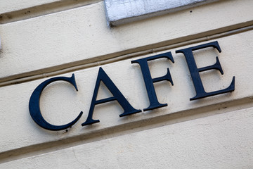 Cafe Sign on Building