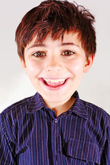 young smiling boy with big head