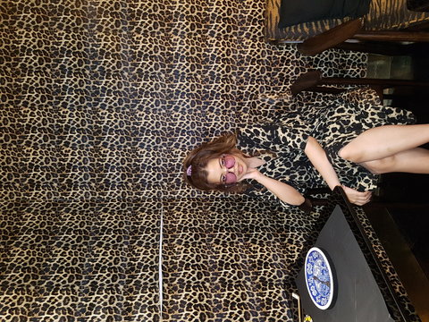 woman sitting on chair near table