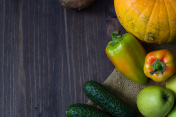 fresh vegetables on a wooden background