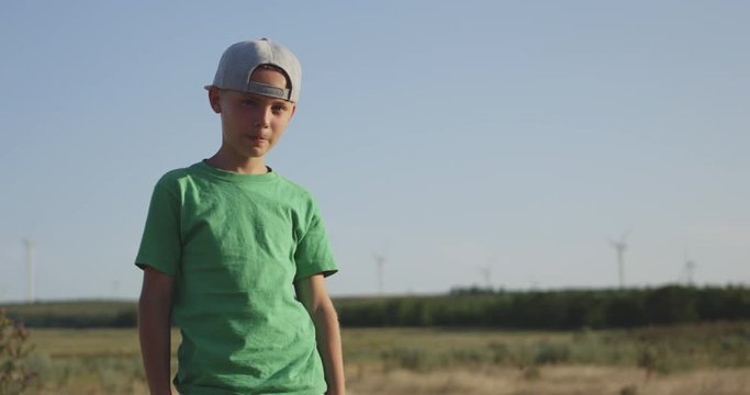Boy standing in field