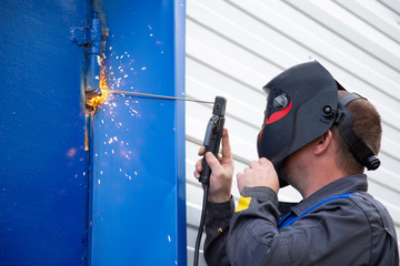 Welder performs welding work using a mask.