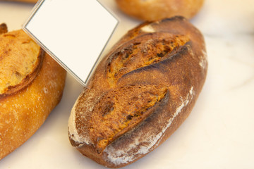 Bread on market shelf.