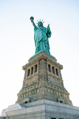 Fototapeta premium Statue of Liberty Stands Welcoming Seafarers to the New York Harbor