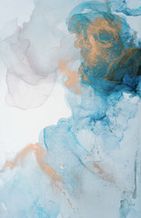 The picture is painted in alcohol ink. Abstraction will perfectly fit into a modern interior. Closeup of the painting. Colorful abstract painting background.