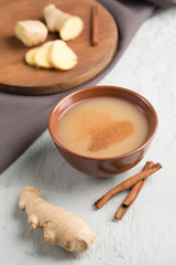 Tea masala in a Cup with the winter spices of cinnamon and ginger