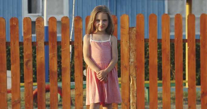 Little girl smiling and posing