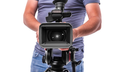 Cameraman. Video camera operator isolated on a white background.