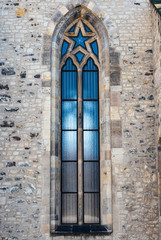 Fototapeta na wymiar Stylish window in medieval synagogue facade