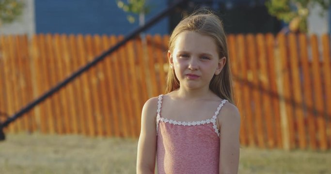 Little girl smiling and posing