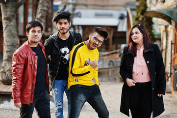 Group of asian people friends posed outdoor street together.