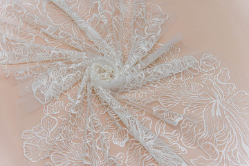 Texture lace fabric. lace on white background studio. thin fabric made of yarn or thread. a...