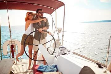 Foto op Plexiglas luxury couple on the boat enjoy on summer holiday. © luckybusiness