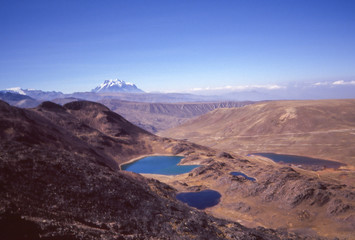 Mountain lakes on Chacaltaya with Mount Illimani in Bolivia in the background.