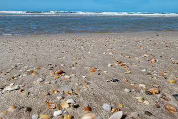 Fototapeta na wymiar Praia sol entardecer areia mar