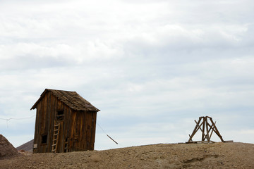 warped wooden shack at mine in Calico ghost town