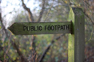 wooden public footpath sign
