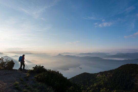 Mountaineers in the early morning with the Bavarian Alps, Herzogstand, lake Walchensee, Upper Bavaria, Bavaria, Germany, Europe