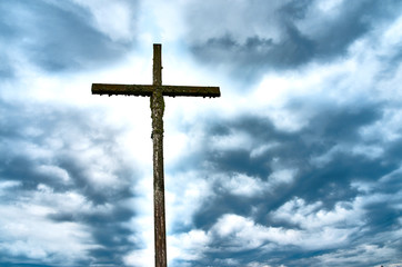 cross against a cloudy sky