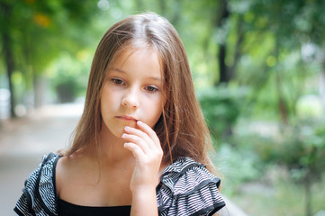 Little cute girl street city lifestyle shooting, summer, smiling at camera