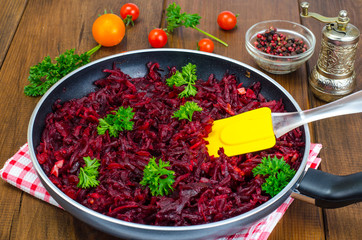 Dietary dishes. Stewed beet in frying pan