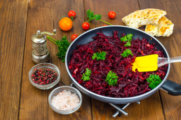 Dietary dishes. Stewed beet in frying pan