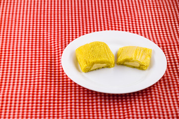 Pamonha, Brazilian sweet corn with cheese filling. Pamonha typical of Brazil, food of the state of minas gerais and goiais. Concept of traditional food. Brazilian food at rural parties