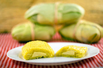 Pamonha, Brazilian sweet corn with cheese filling. Pamonha typical of Brazil, food of the state of minas gerais and goiais. Concept of traditional food. Brazilian food