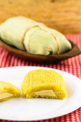 Pamonha, Brazilian sweet corn with cheese filling. Pamonha typical of Brazil, food of the state of minas gerais and goiais. Concept of traditional food. Brazilian food